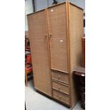 A bamboo and woven cane wardrobe, 175cms high 95cm