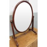 A Victorian large oak oval dressing table mirror w