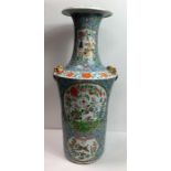 A large Chinese vase with tall neck, moulded gilt
