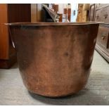 A copper "boiler" log bin, 51cms diam 37cms high