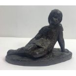 A bronzed resin figure of reclining girl by Heredi