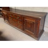 A late 18th Century oak dresser base fitted with t