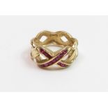 **WITHDRAWN** A Franklin Mint 14 carat gold ruby set ring, finge