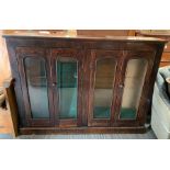 A Victorian rosewood and rosewood effect bookcase