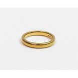 A 22 carat gold plain wedding ring, 4.3 g gross