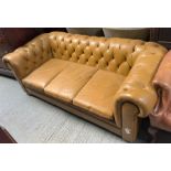 A Victorian style Chesterfield three seater settee