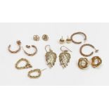 **WITHDRAWN** A collection of seven pairs of 9 carat gold earrin