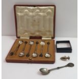 A cased set of six silver bean end coffee spoons;