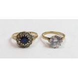 A 9 carat gold single stone ring; with a cluster r