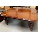 A Victorian rectangular mahogany extending dining