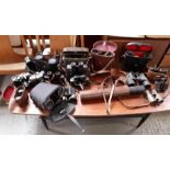A quantity of assorted binoculars, various sizes,