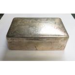 A silver cigarette box, with engraved signatures,