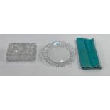 A Tiffany & Co glass plate with moulded border, or