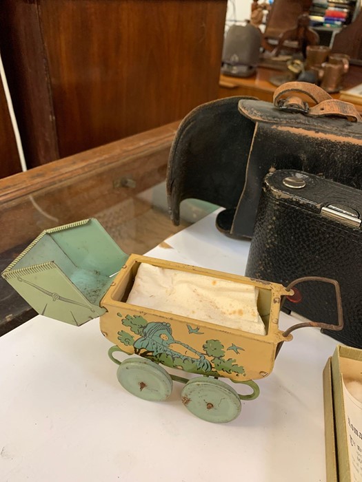 Old taste camera, child's tin plate pram & a boxed - Image 3 of 4