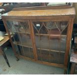 Oak glass fronted display cabinet