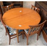 Mid century extending circular dining room table w