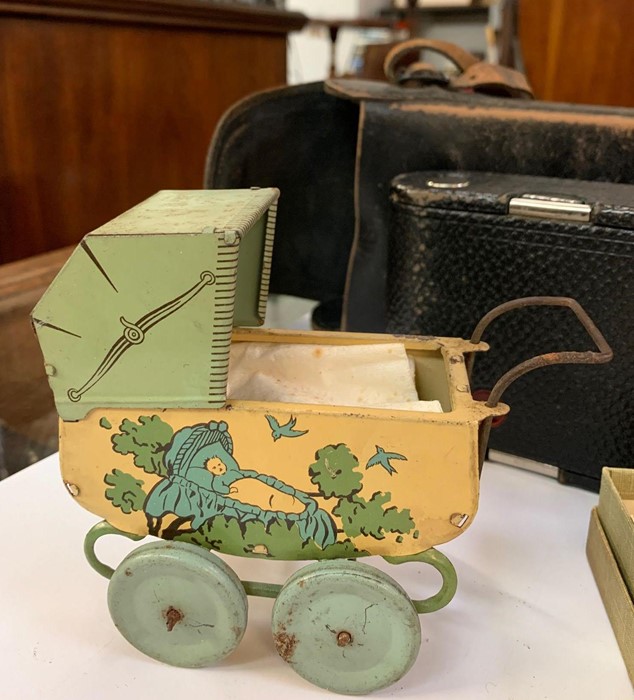 Old taste camera, child's tin plate pram & a boxed - Image 2 of 4