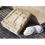 Small carved stoneware lion on plinth & old stone