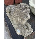 Stone garden lion on plinth