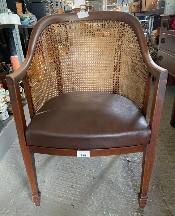 Early 20th century caned back armchair with leathe