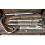 Collection of old motorcycle exhaust pipes