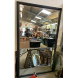 Very large mirror with black ribbed frame