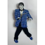 A mid century Elvis Presley swinging hip battery o