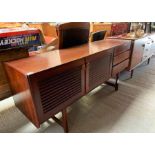 A rosewood mid century sideboard by A H Mcintosh,