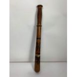An oak police truncheon with transfer decorated cr