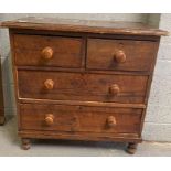 A Victorian stained pine chest of two short and two