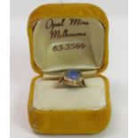 An opal triplet set ring, stamped ‘9ct’, finger si