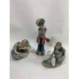A Lladro porcelain figure of a girl feeding ducks,