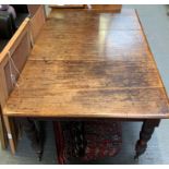 A 20th century mahogany and pine dinning table, 72