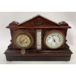 A 20th century oak clock, barometer and thermomete