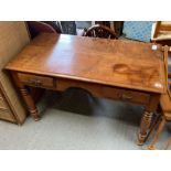An early to mid-20th century stained pine hall tab