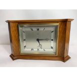 An Elliot oak cased mantel clock, of unusual form,