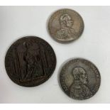 Two similar commemorative Russian coins, each with