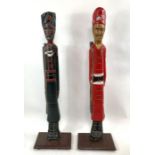 Two 20th century painted carved wood figures, with