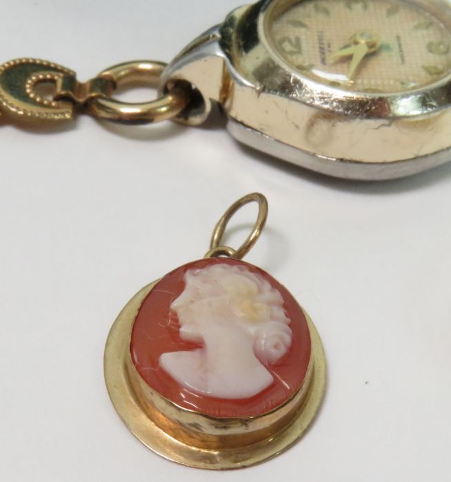 A 9 carat gold three stone ring; a cameo pendant; - Image 3 of 4