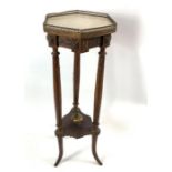 A late 19th/early 20th century jardiniere stand, w