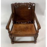 An early 20th century oak metamorphic table chair,