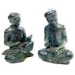 A pair of Austin cast plaster figures of scholars,