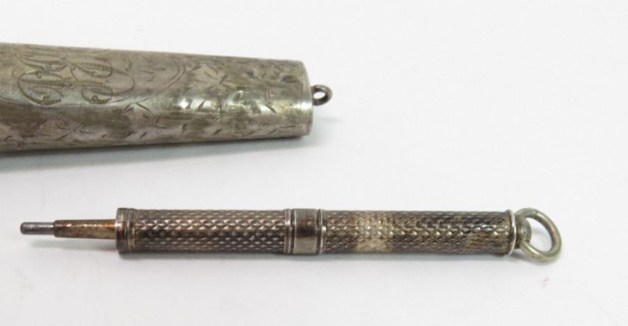 A Victorian silver scent bottle; an amber cheroot - Image 3 of 6