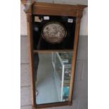 A 19th century gilt framed pier mirror, with an ov