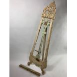 Modern painted easel with carved decoration