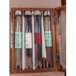 Antique box containing glass tubes with sterilised