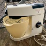 Vintage Kenwood mixer together with a small pot cu