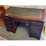 Modern mahogany twin pedestal desk with green leat