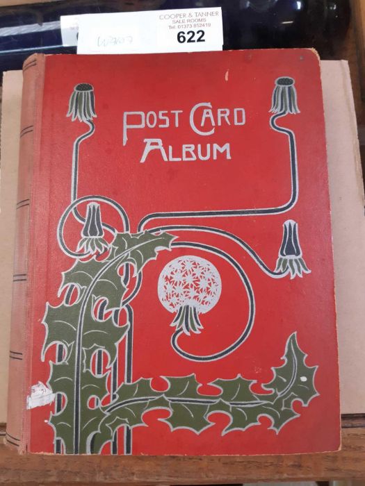 Postcard album with various