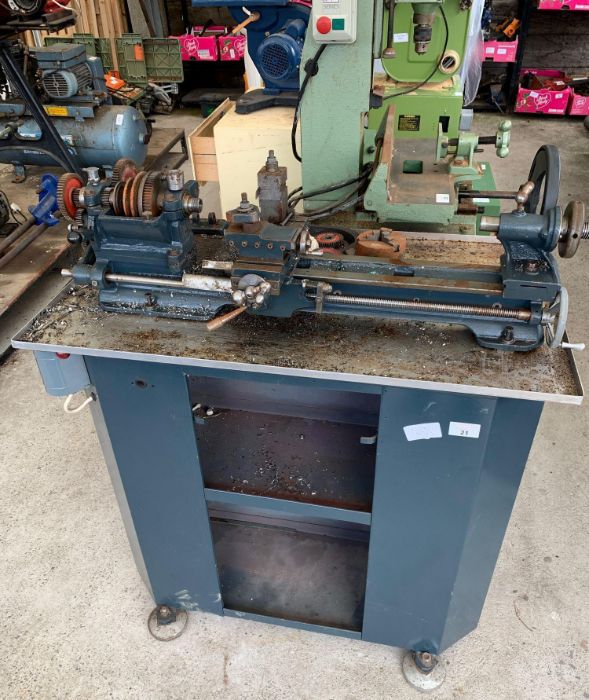 Lathe with cabinet below & box of assorted accesso